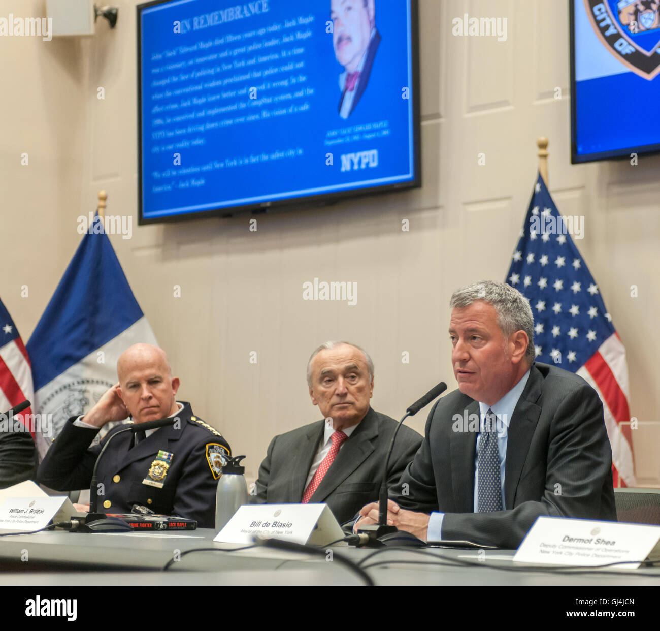 New York Mayor Bill de Blasio, right, and NYPD Commissioner William Bratton, center, and Chief of Department Jimmy O'Neill report to the press in the Jack Maples Compstat Room at One Police Plaza in New York on Thursday, August 4, 2016. The officials answered police related questions from the press as well as briefing the media on the ongoing decrease in violent crime in the city. O'Neill is to take over as commissioner in September when Bratton leaves. (© Richard B. Levine) Stock Photo