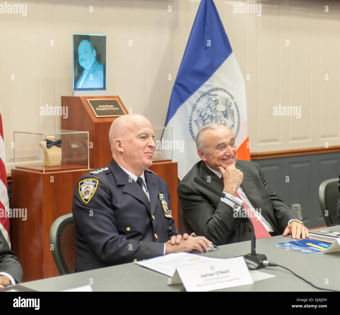 NYPD Commissioner William Bratton, right, and Chief of Department Jimmy O'Neill report to the press in the Jack Maples Compstat Room at One Police Plaza in New York on Thursday, August 4, 2016. The officials answered police related questions from the press as well as briefing the media on the ongoing decrease in violent crime in the city. O'Neill is to take over as commissioner in September when Bratton leaves. (© Richard B. Levine) Stock Photo