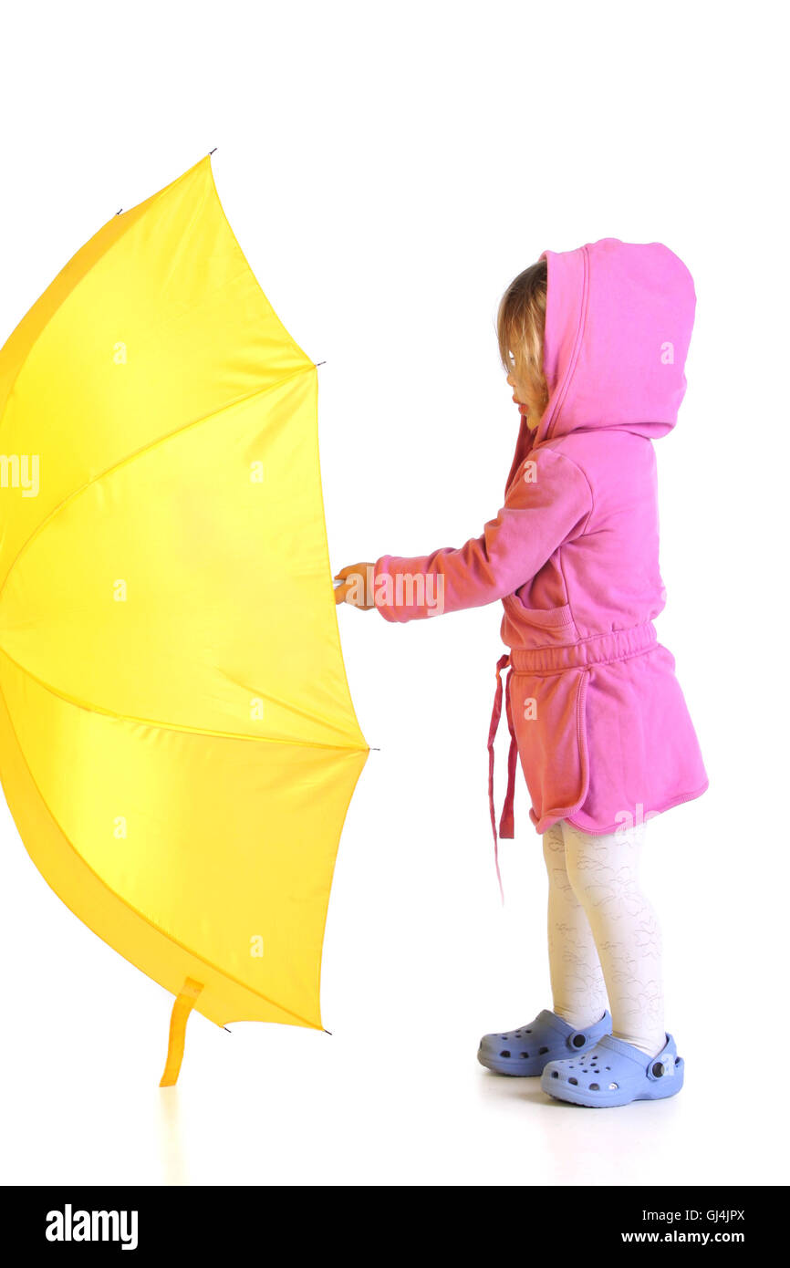 girl with yellow umbrella Stock Photo - Alamy