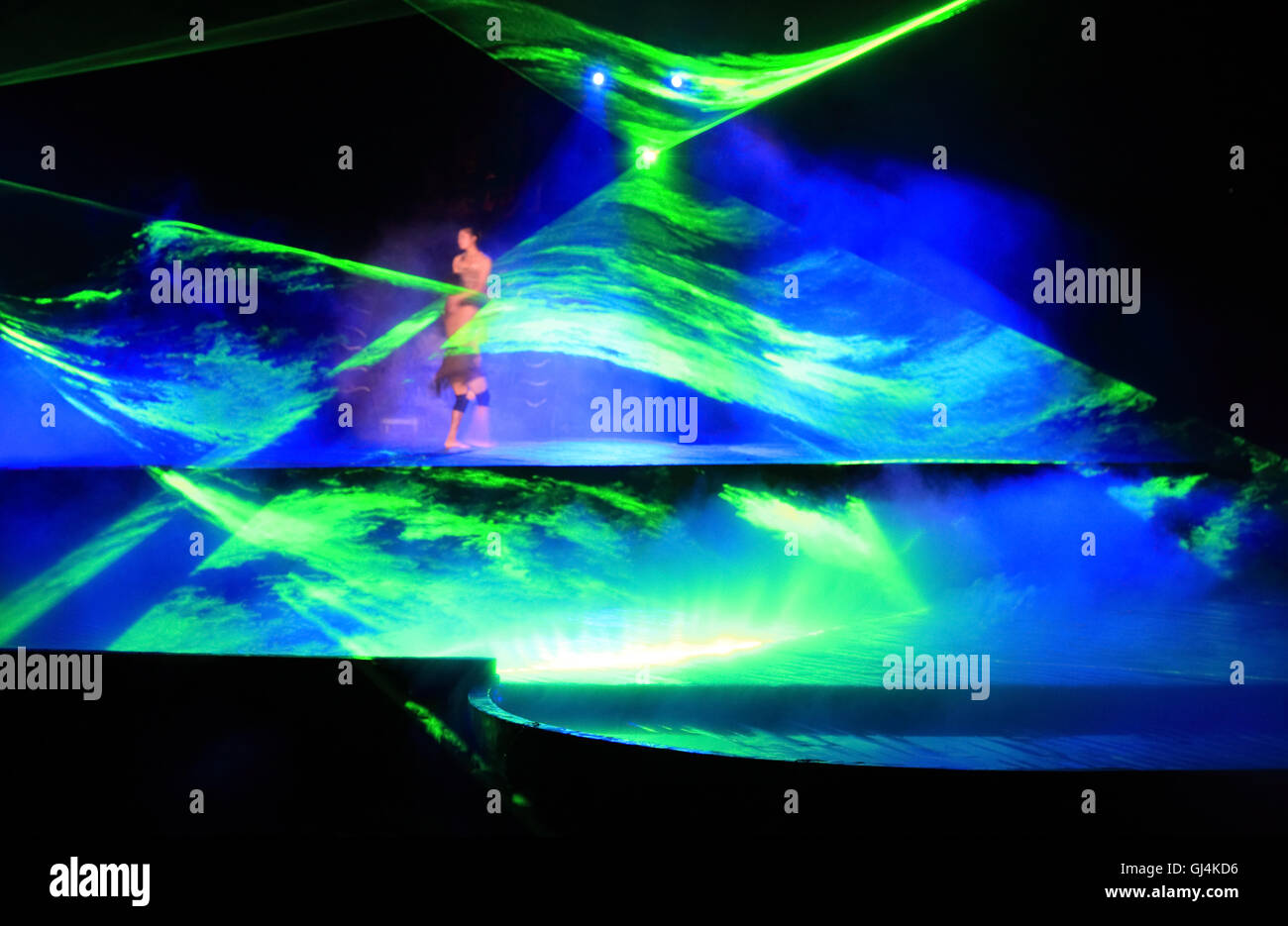 a laser light effect in a performance Stock Photo Alamy