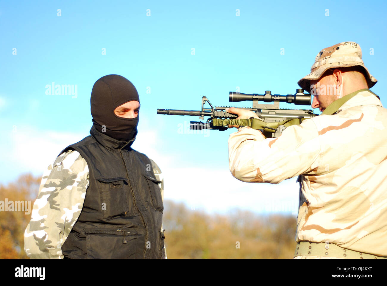 soldier aiming terrorist Stock Photo