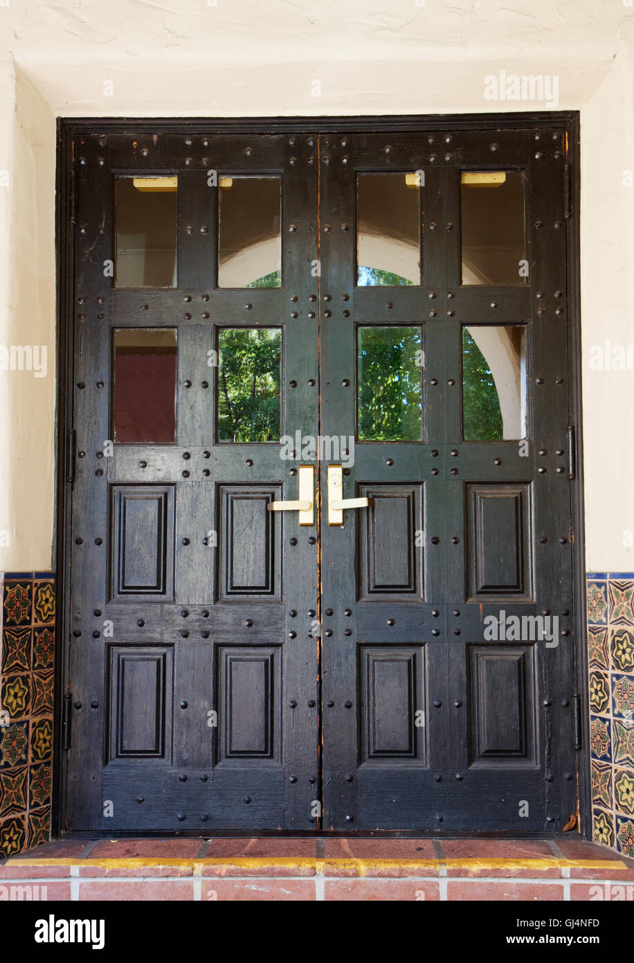 Black spanish doors Stock Photo Alamy