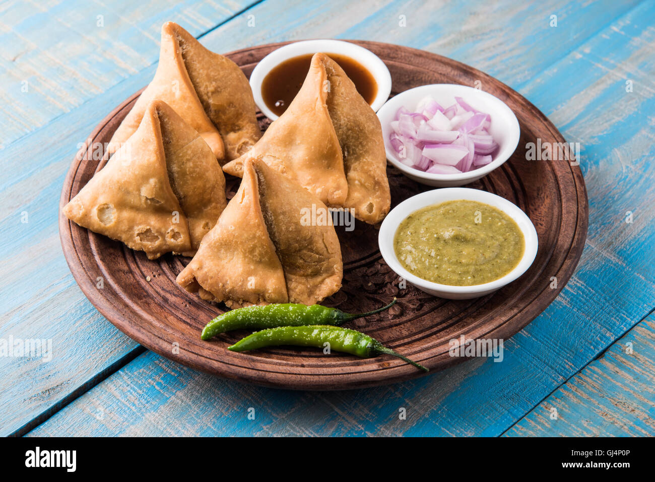 Veg potato Samosa with sauces, Homemade Fried Indian Samosa with Mint