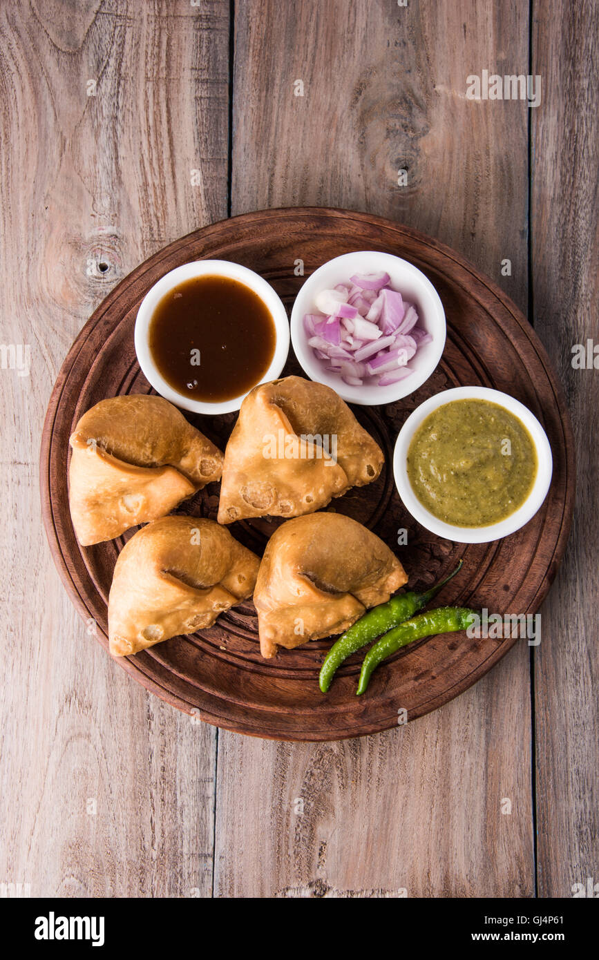 Veg potato Samosa with sauces, Homemade Fried Indian Samosa with Mint