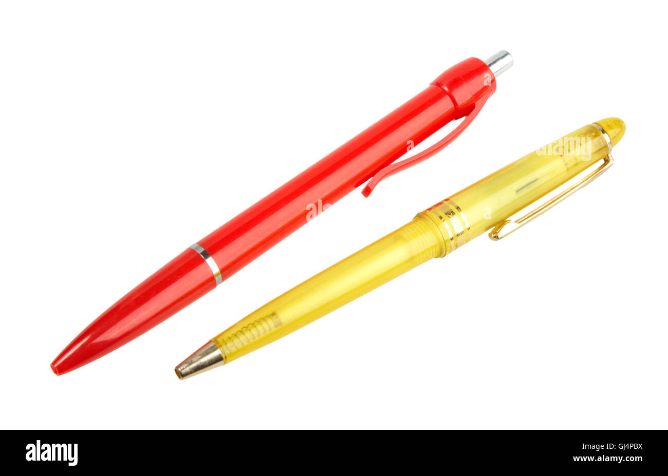 Yellow and red ball point pens. Stock Photo