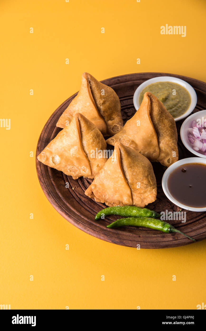Veg potato Samosa with sauces, Homemade Fried Indian Samosa with Mint