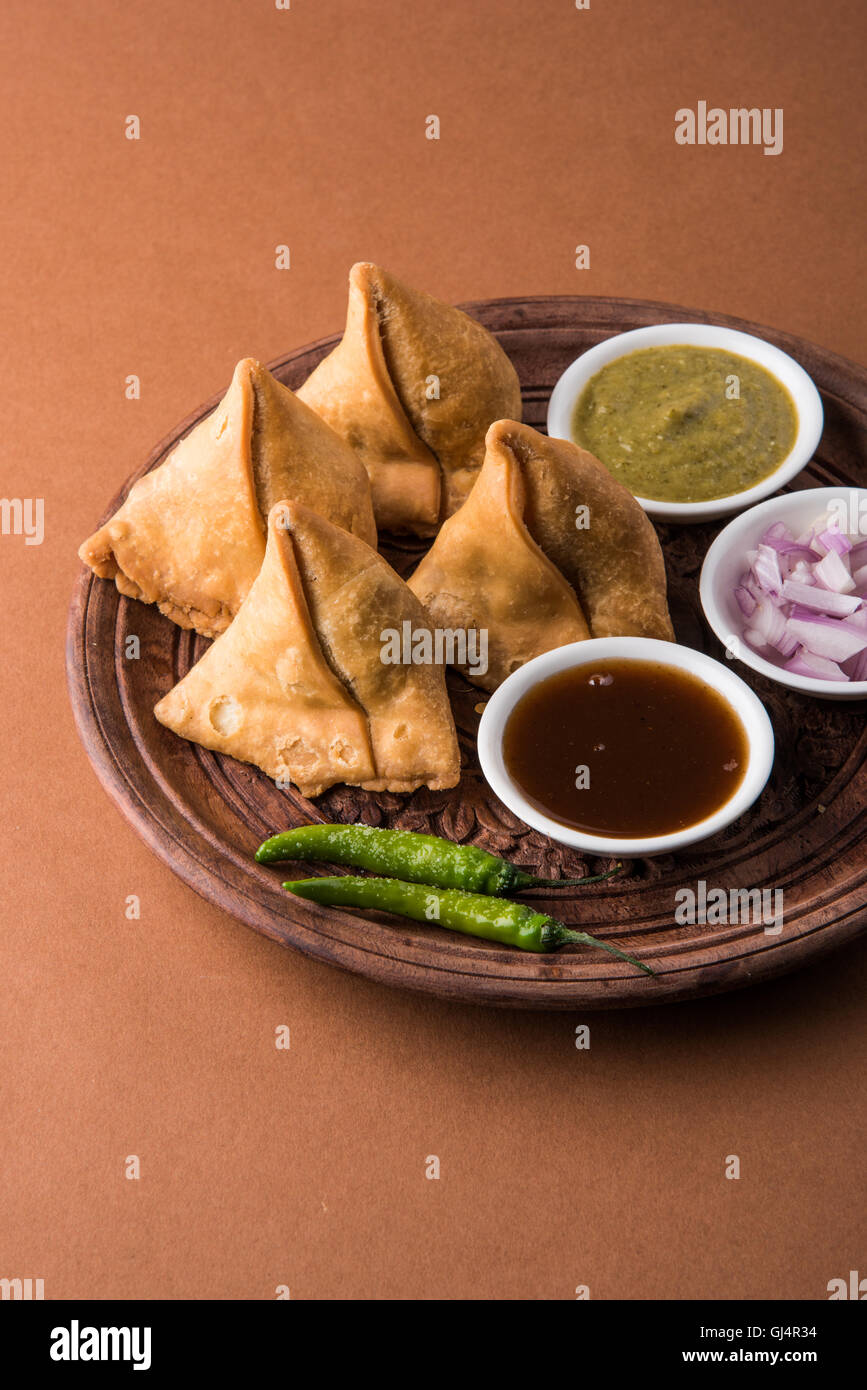 Veg potato Samosa with sauces, Homemade Fried Indian Samosa with Mint
