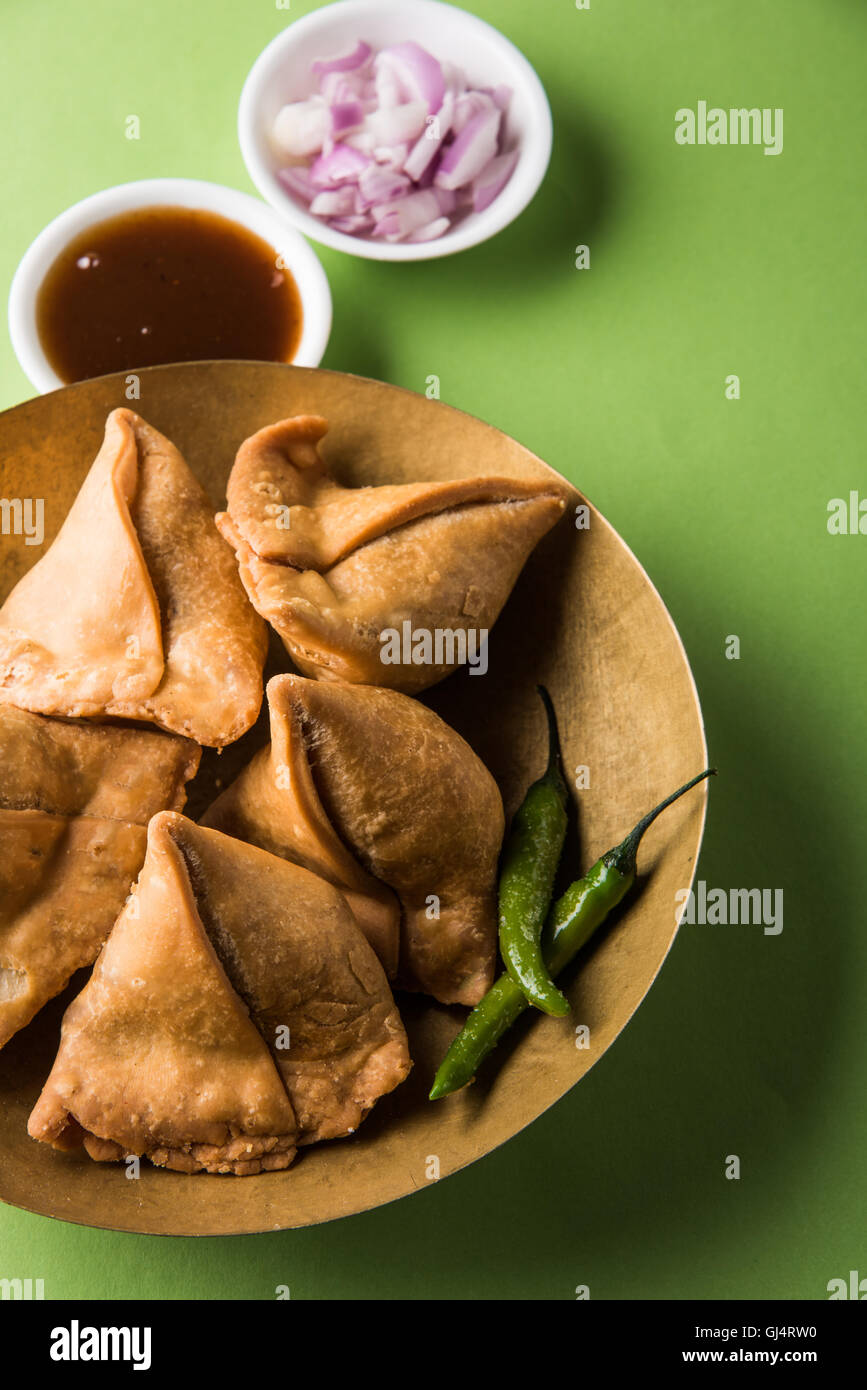 Veg potato Samosa with sauces, Homemade Fried Indian Samosa with Mint