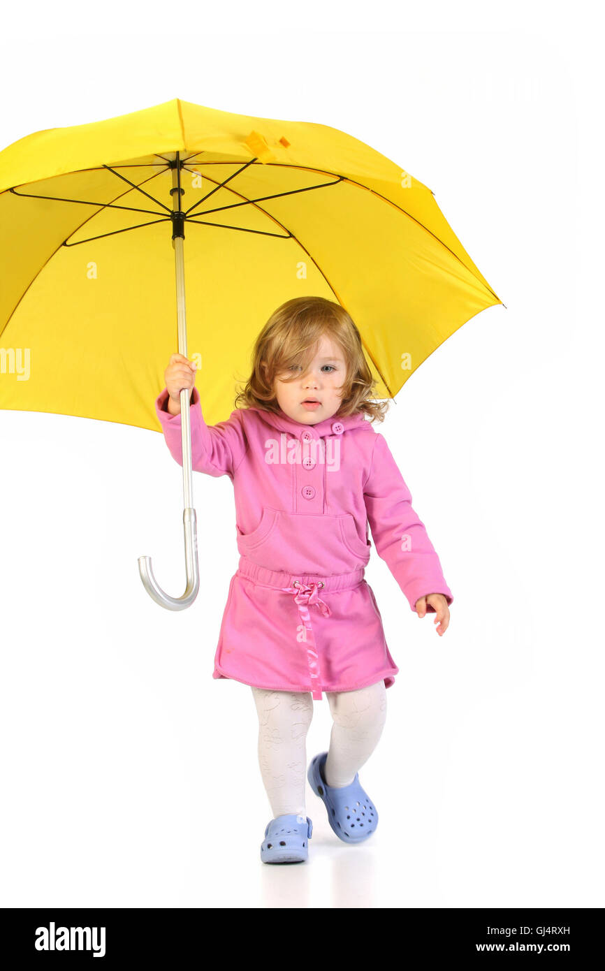 girl with yellow umbrella Stock Photo - Alamy