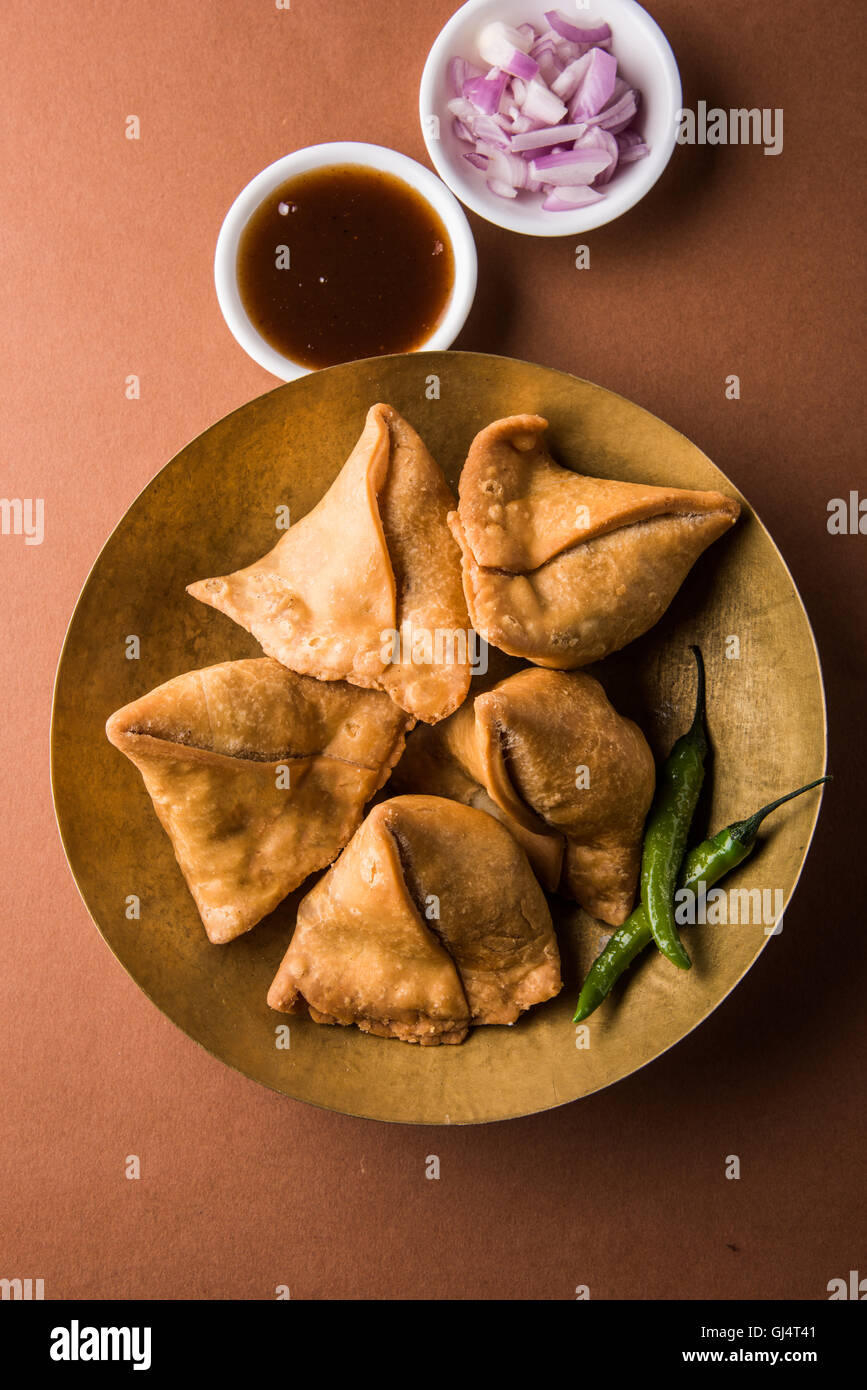 Veg potato Samosa with sauces, Homemade Fried Indian Samosa with Mint