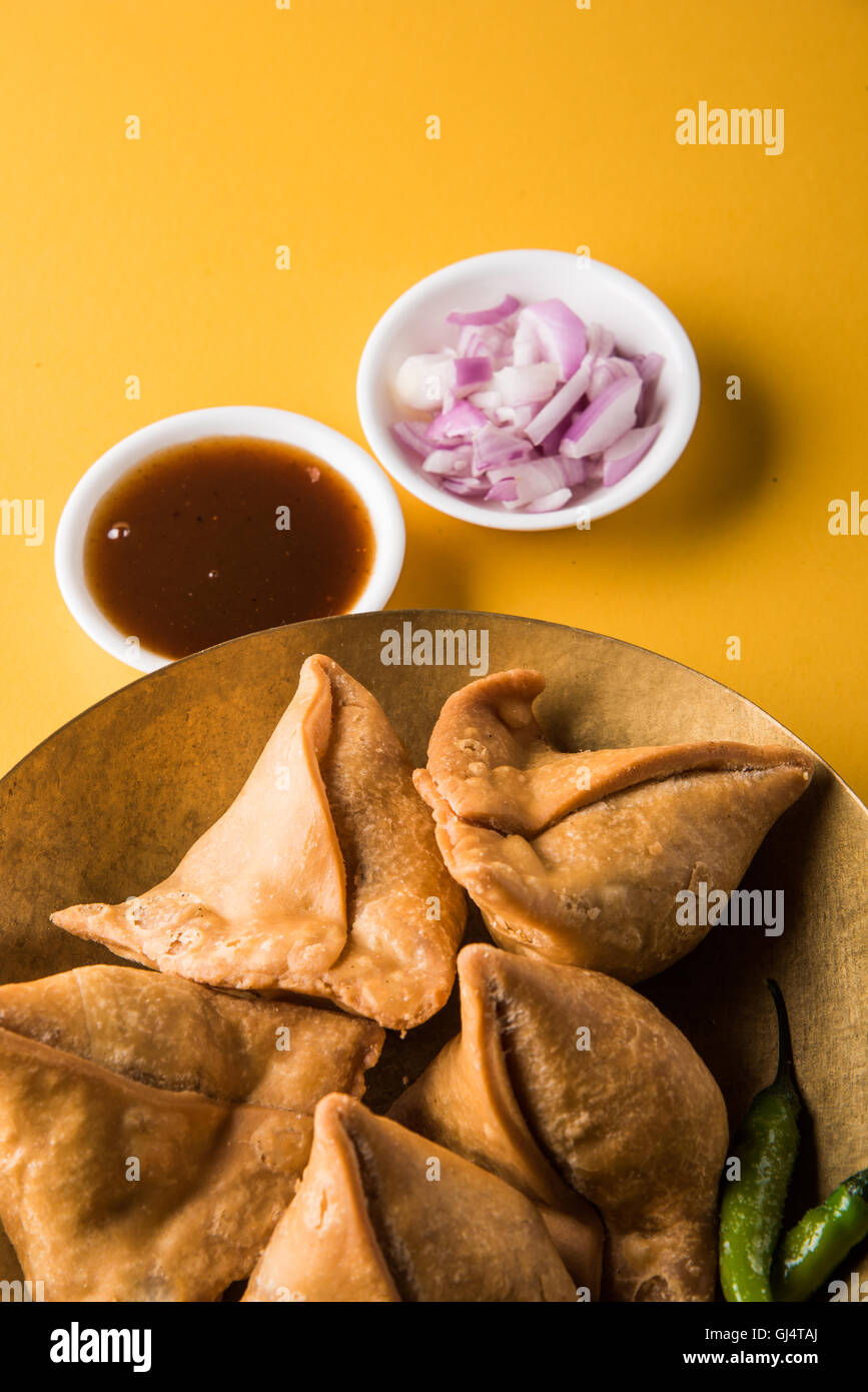 Veg potato Samosa with sauces, Homemade Fried Indian Samosa with Mint