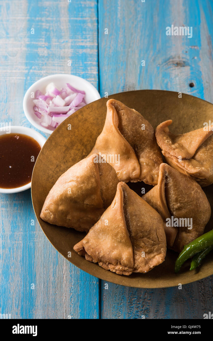 Veg potato Samosa with sauces, Homemade Fried Indian Samosa with Mint