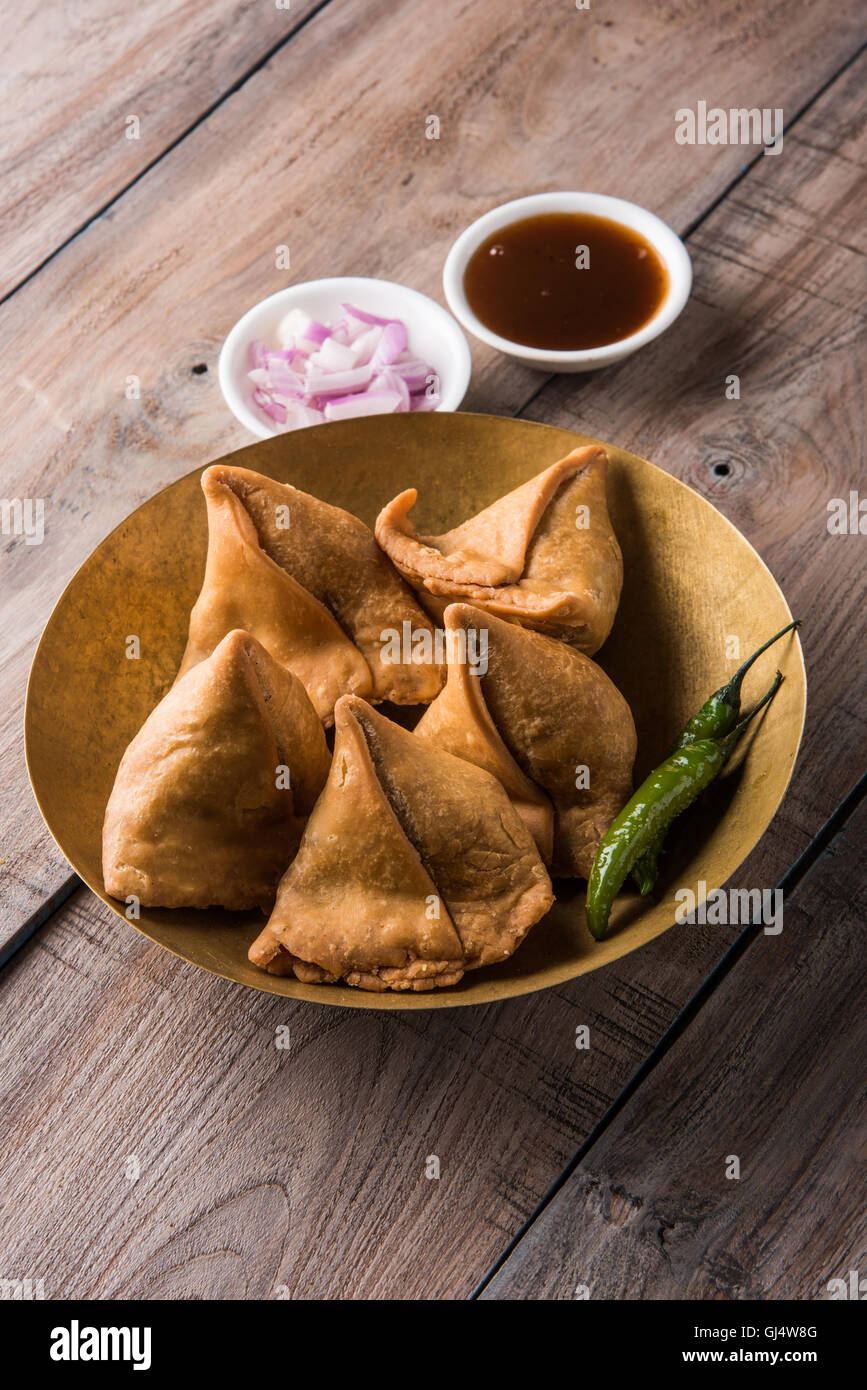 Veg potato Samosa with sauces, Homemade Fried Indian Samosa with Mint