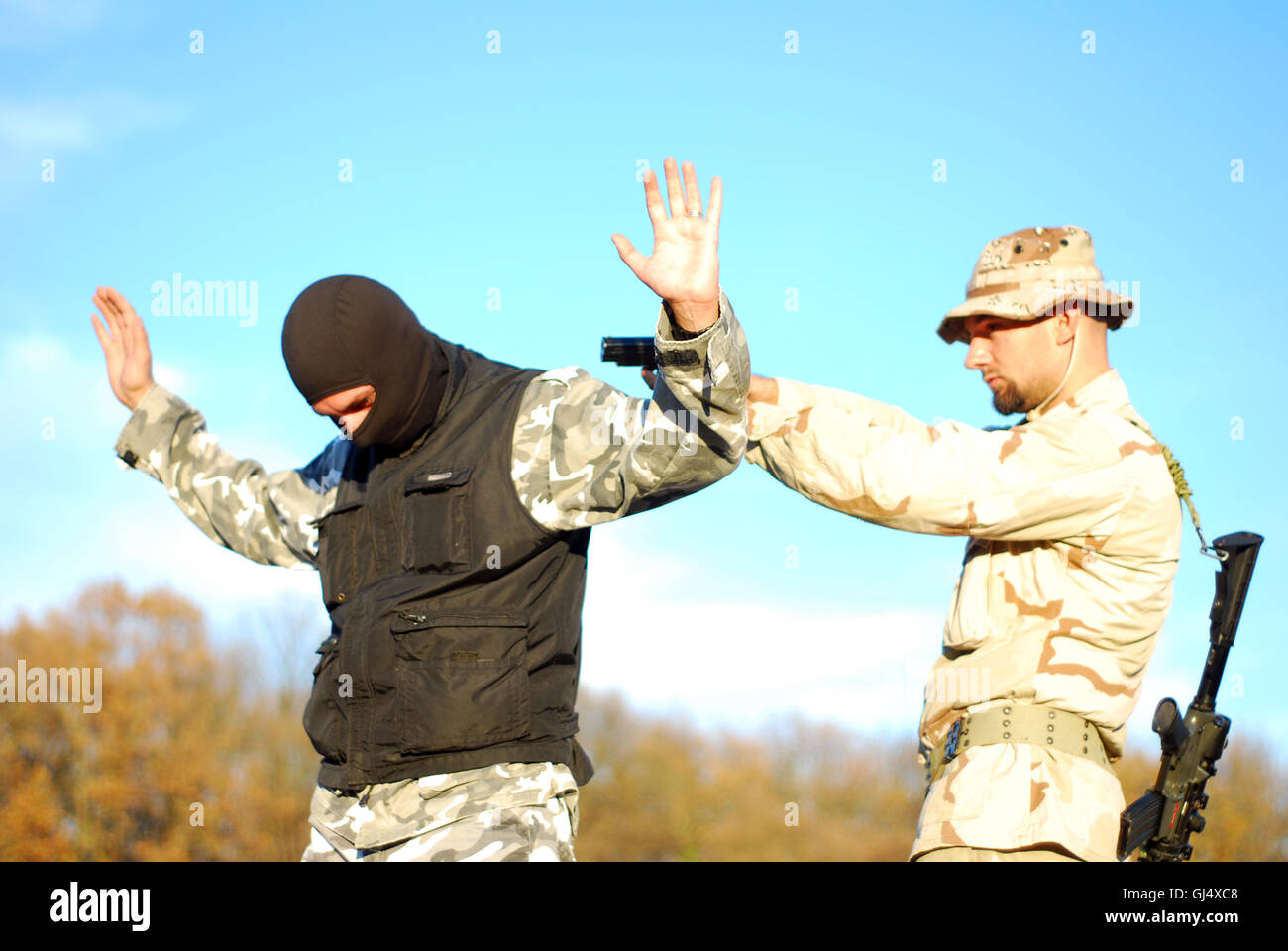 soldier aiming terrorist Stock Photo