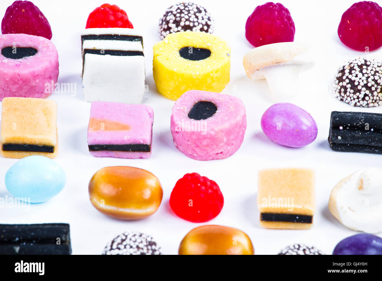 Many candy on white background.Candy colors Stock Photo - Alamy