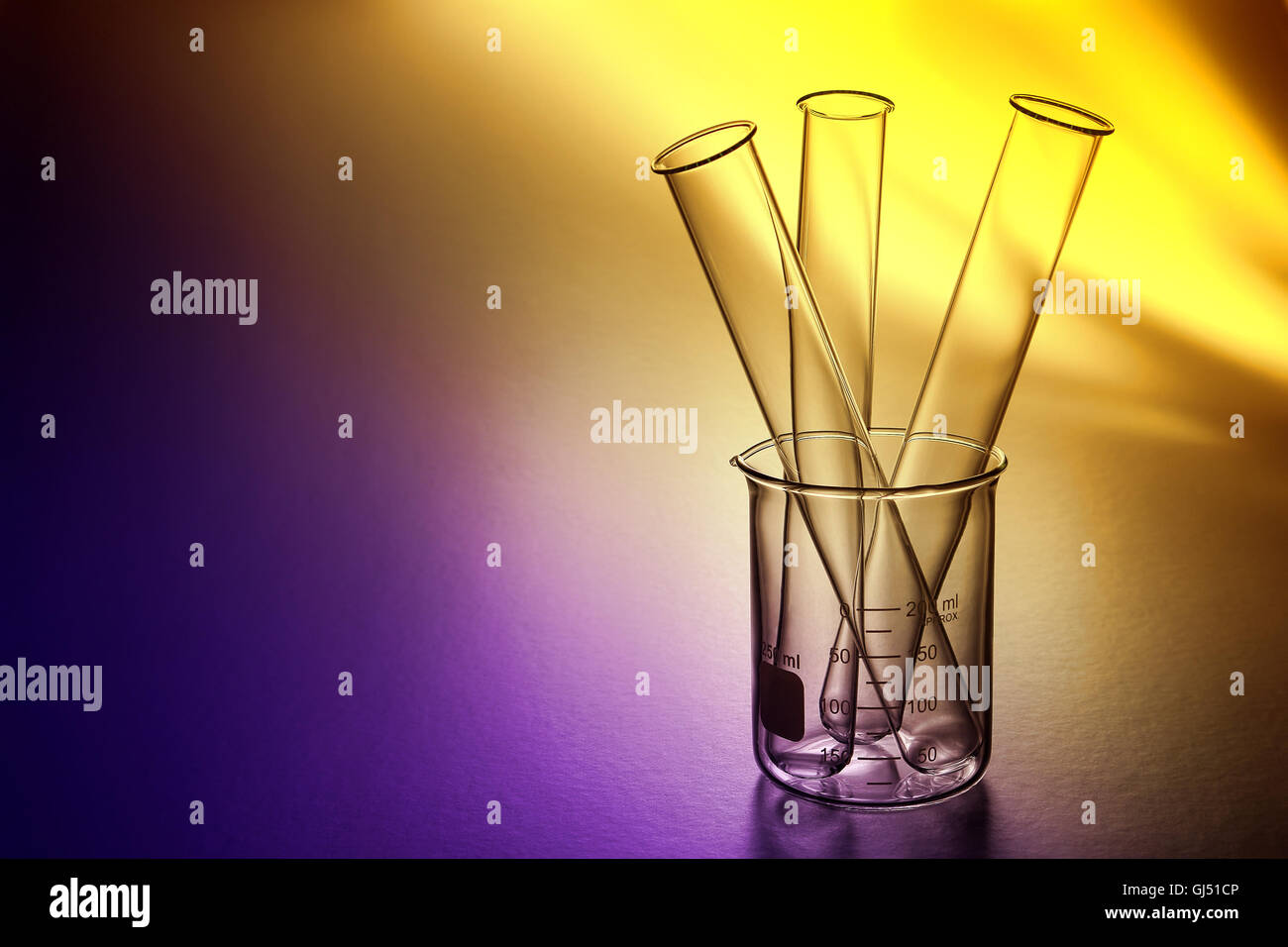 Laboratory glass test tubes in an empty clear graduated beaker ready