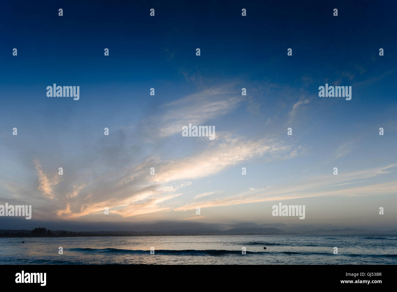 Evening skies over Byron Beach in Byron Bay. Stock Photo