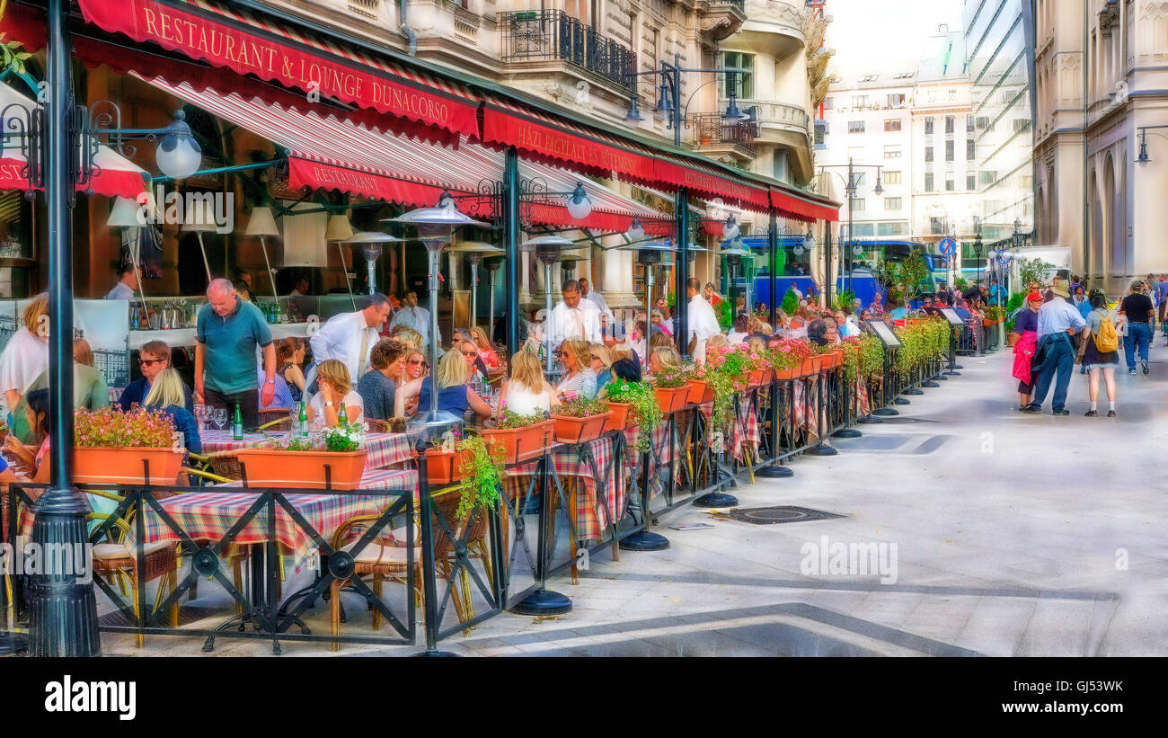 Diners on the streets of Budapest on a warm summer's afternoon Stock Photo