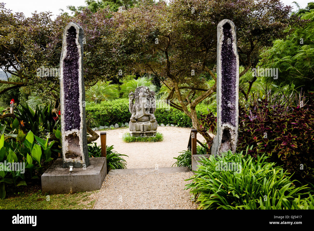 The Amethyst Gateway and Ganesh statue at Crystal Castle And Shambhala Gardens, close to Byron Bay. Stock Photo