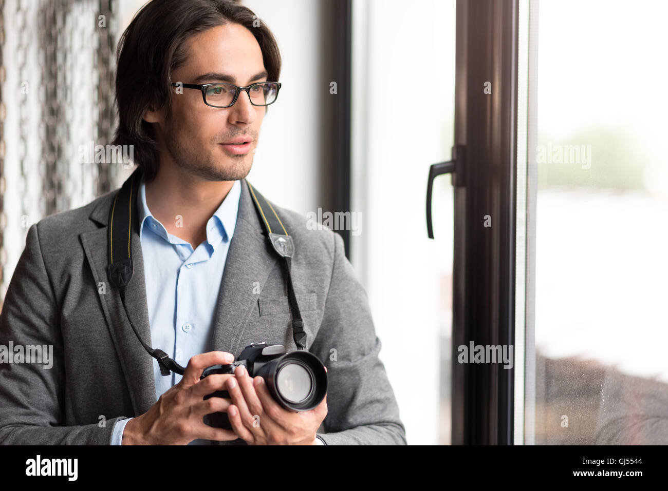Man with photo camera hi-res stock photography and images - Alamy