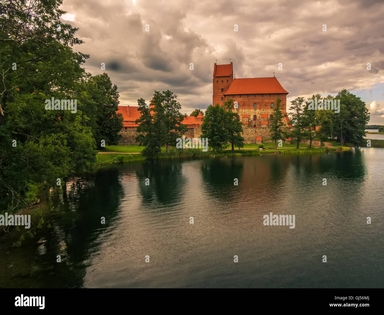 Trakai, Lithuania: Island Castle in the sunset. Historical residence in capital city of Grand Duchy of Lithuania, located in Gal Stock Photo