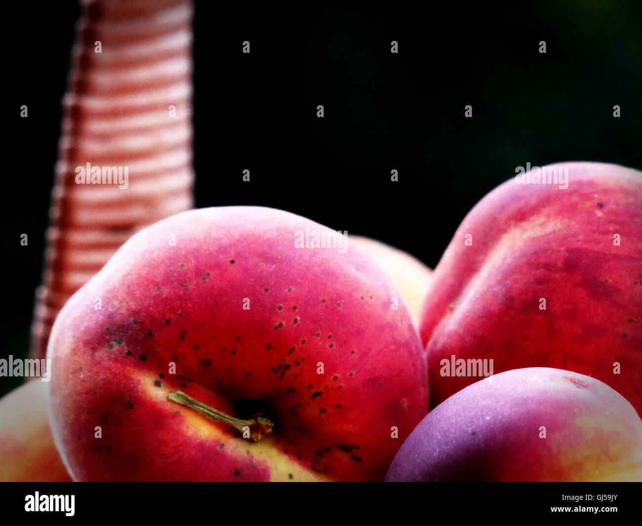 Peaches in a basket Stock Photo Alamy