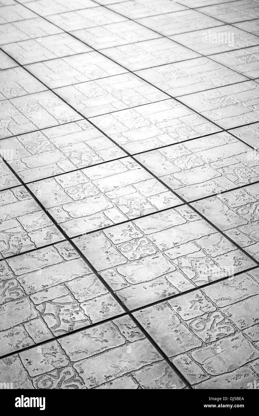 grey modern ceramic floor tiles background texture closeup Stock Photo