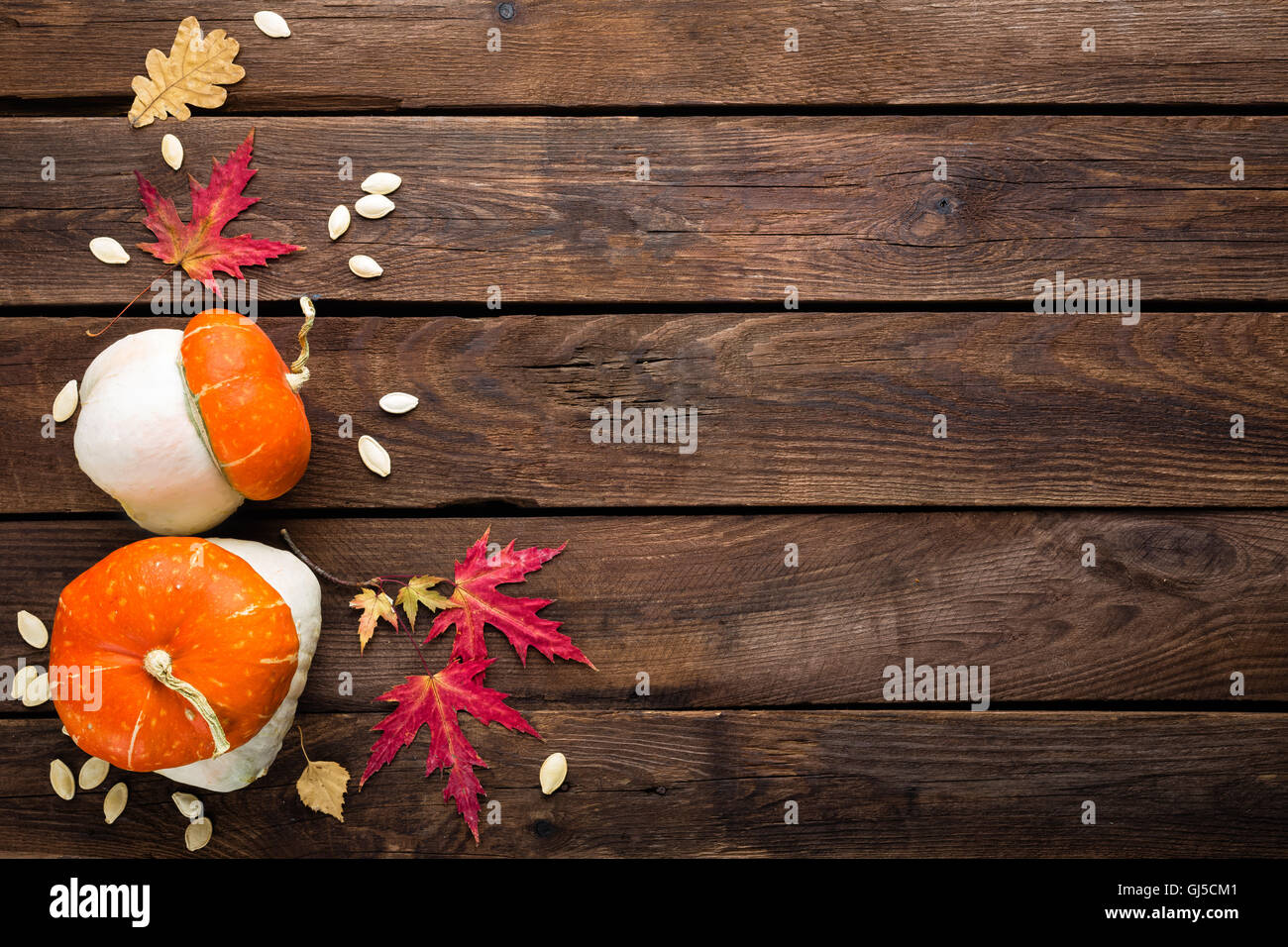 autumn background with leaves and pumpkins, thanksgiving and halloween card Stock Photo