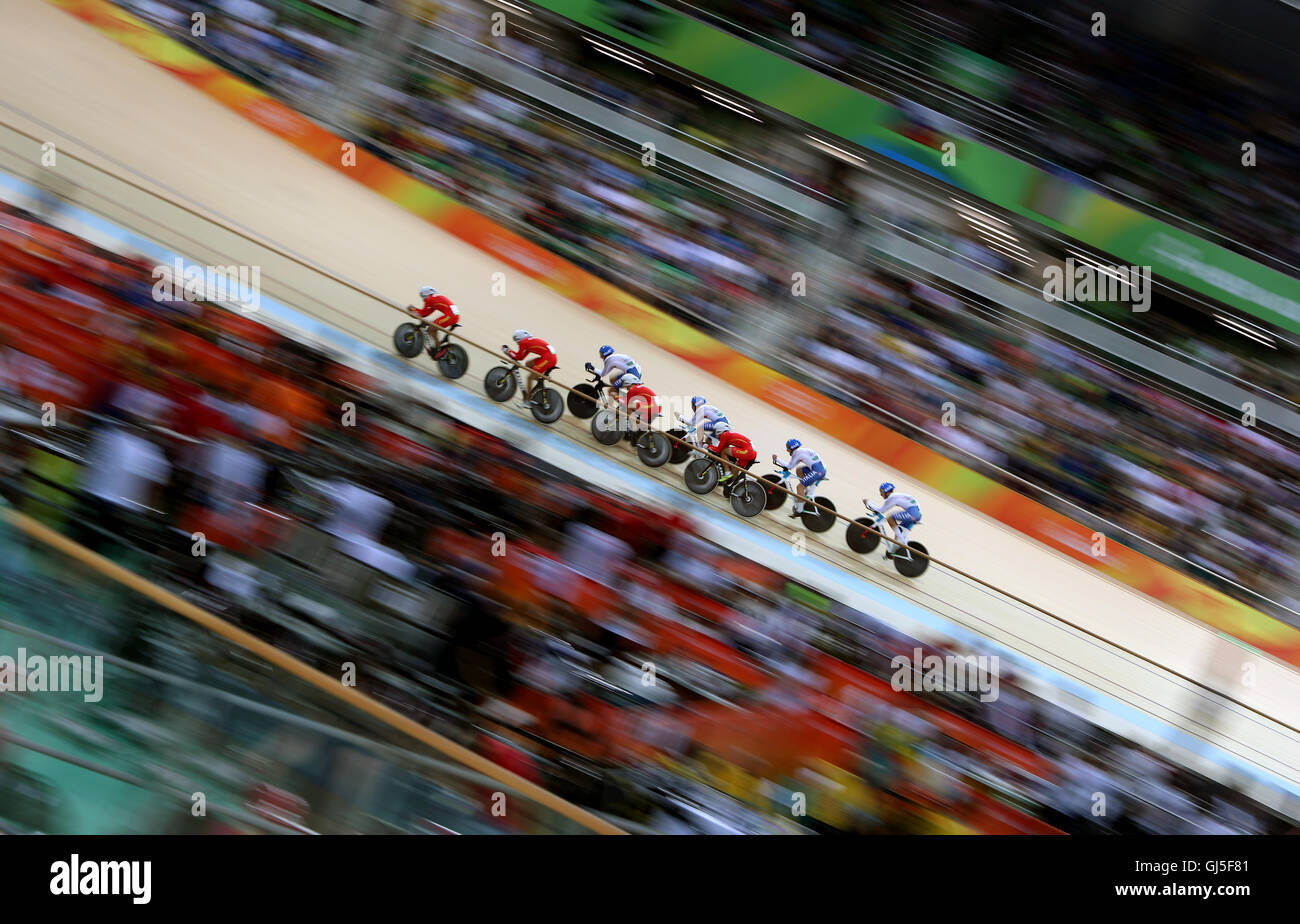 Italy overtake the China team during the Men's Team Pursuit First Round on the seventh day of the Rio Olympics Games, Brazil. Stock Photo
