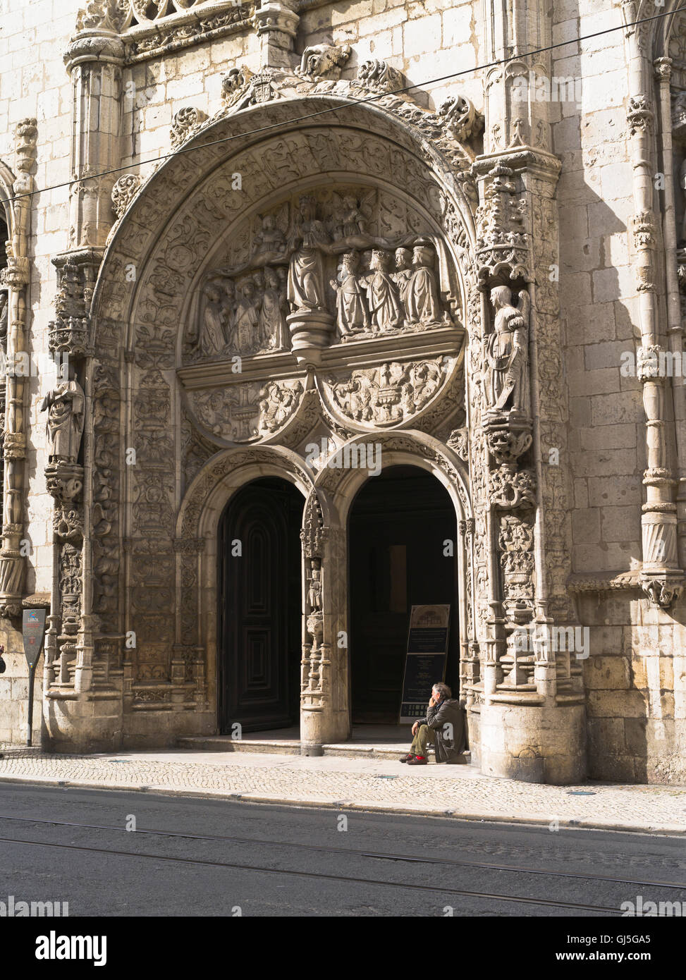 dh church LISBON PORTUGAL Church building beggar at entrance Stock Photo