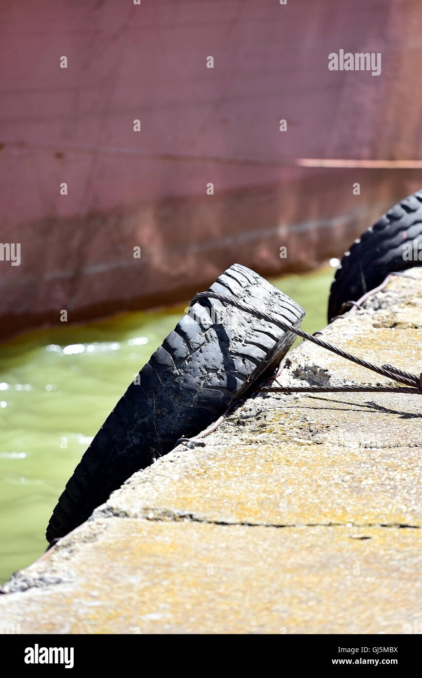 Bumper tyres on a pontoon bridge Stock Photo