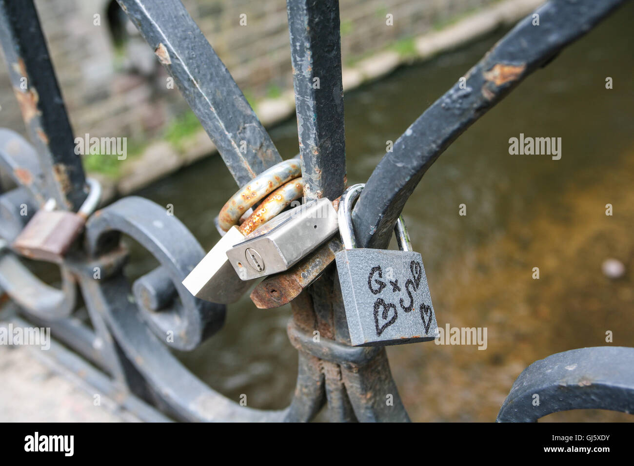 Love Padlocks on bridge over River Vilnia. The love padlocks have the
