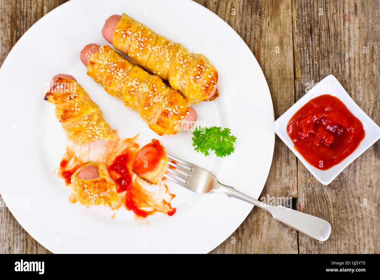 Grilled Sausage in Pastry with Sesame Seeds Stock Photo Alamy