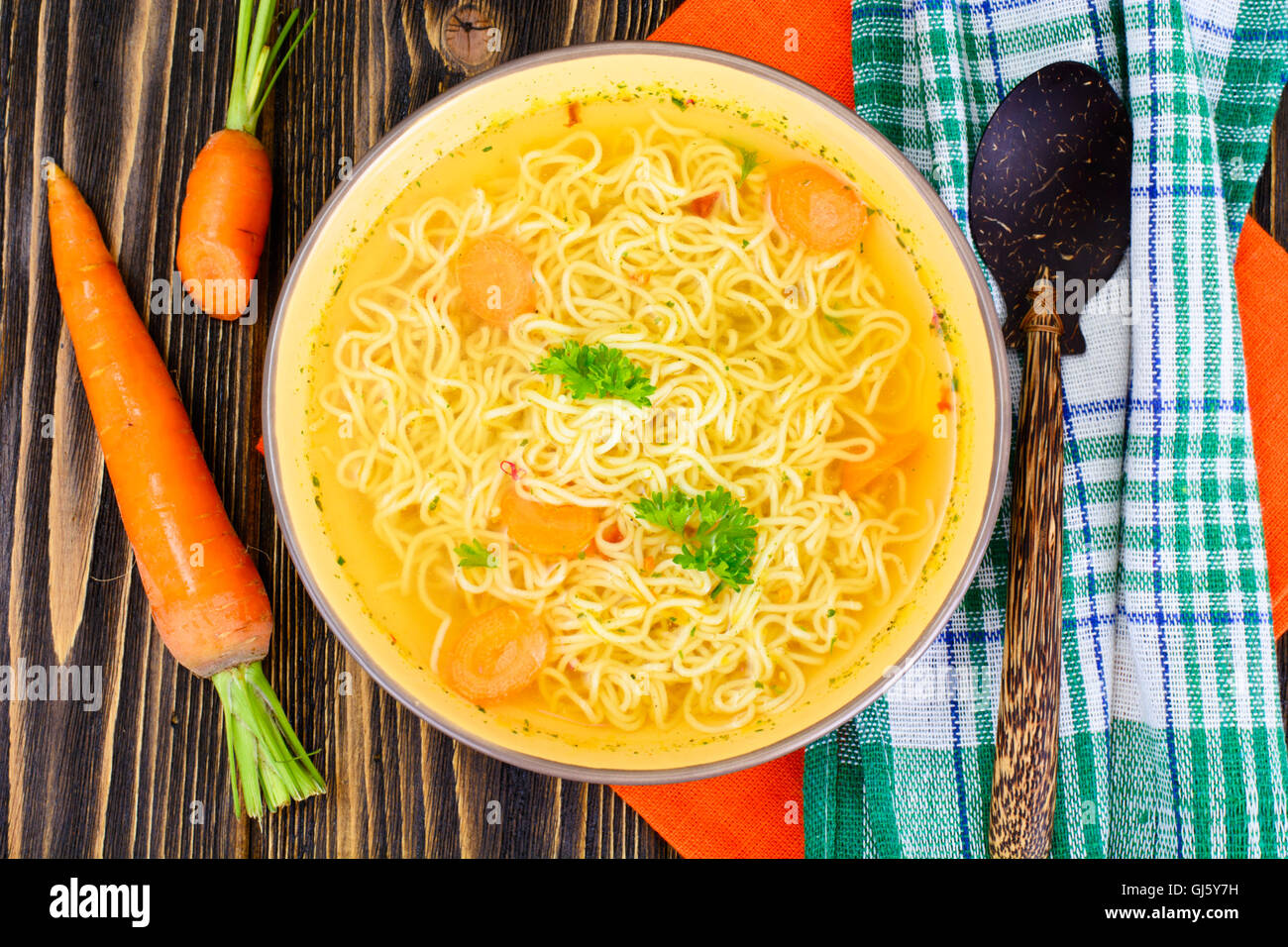 Tasty Chicken Soup with Chinese Noodles Stock Photo