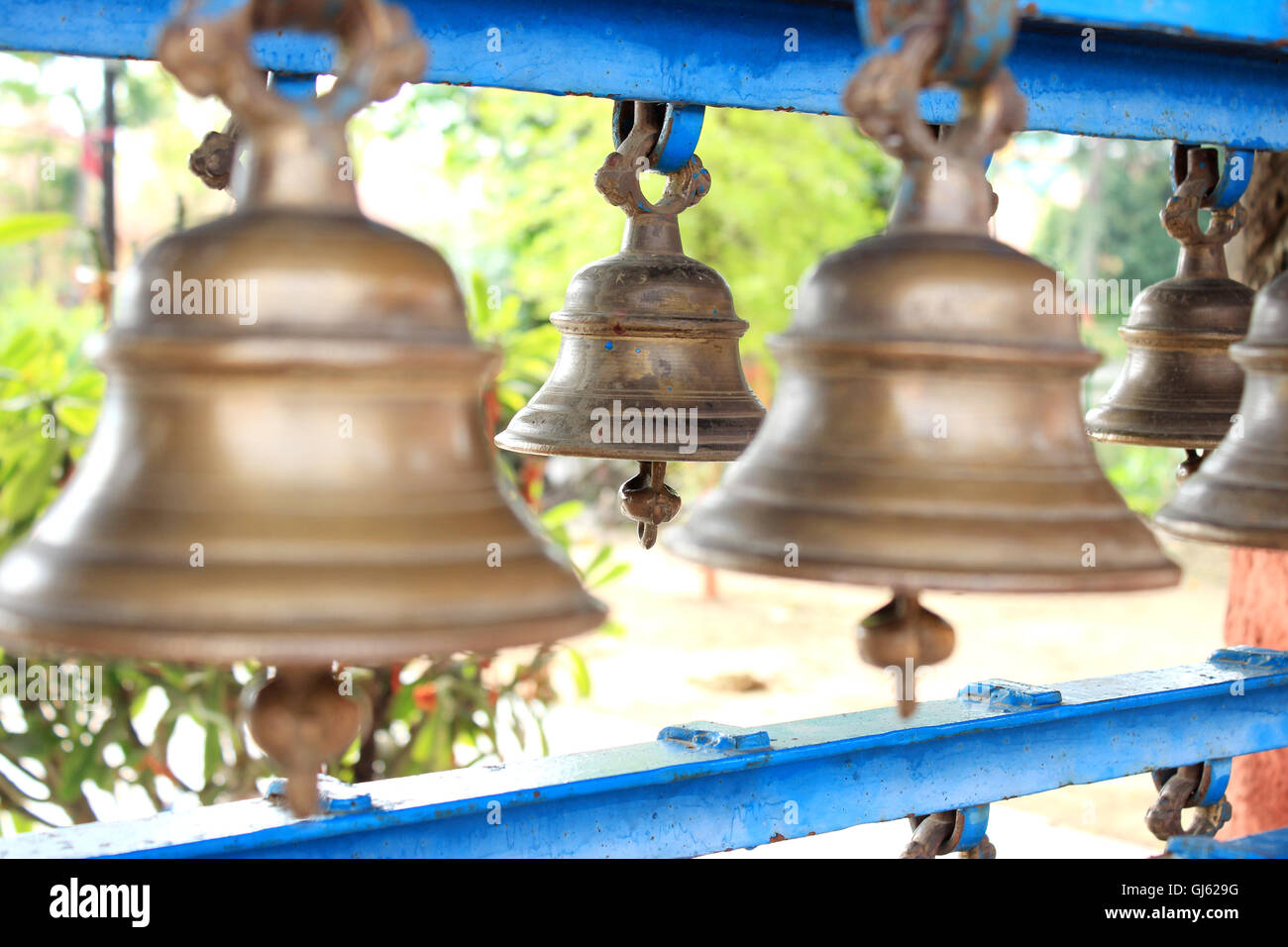 Hindu temple bells. Bells of the old temple in India. Pattern of bells