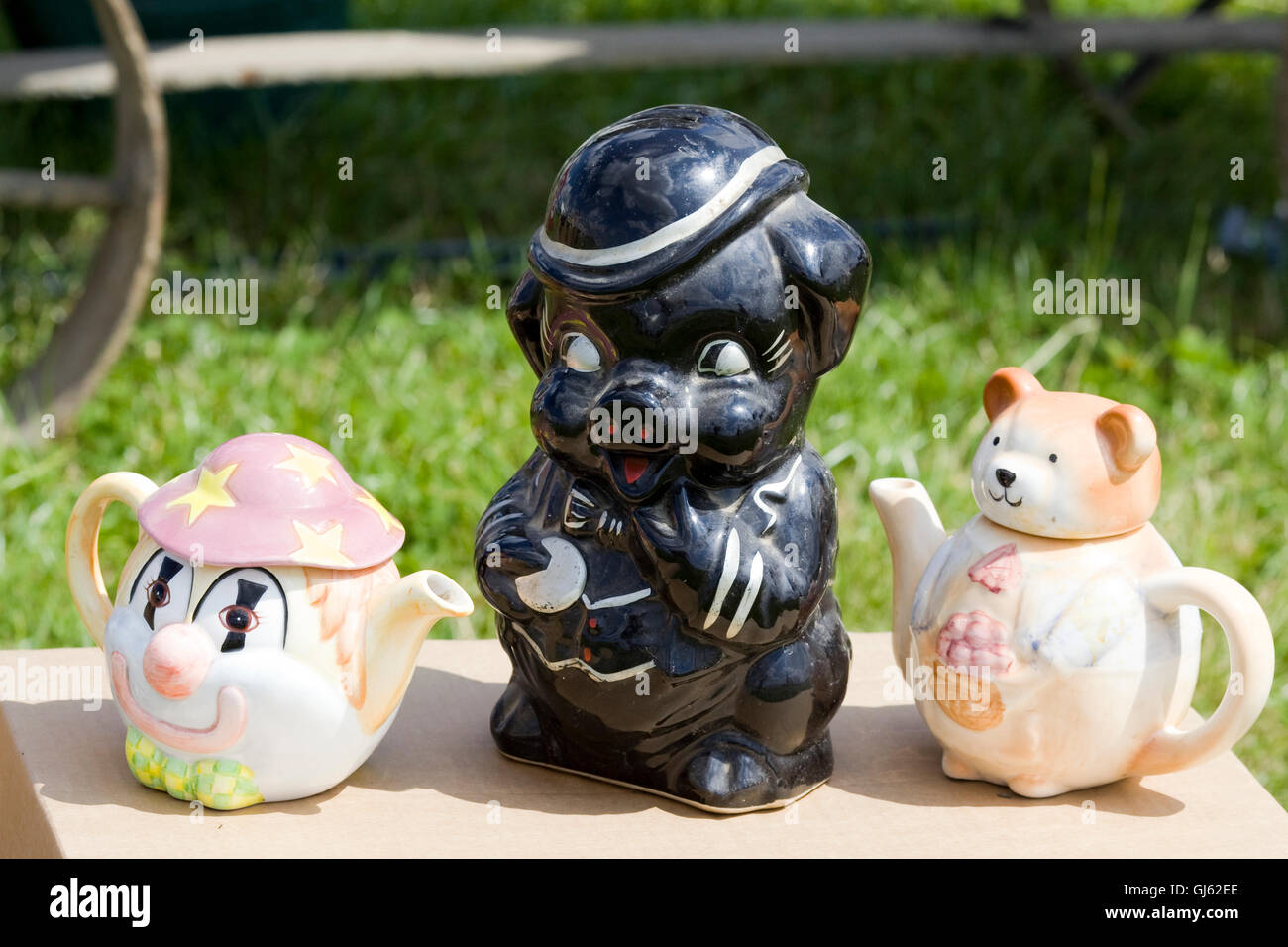 Novelty china teapots and biscuit barrel Stock Photo Alamy