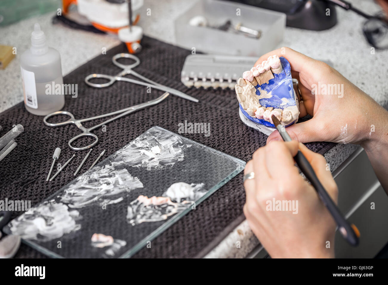 Dental technician working in dental laboratory Stock Photo Alamy