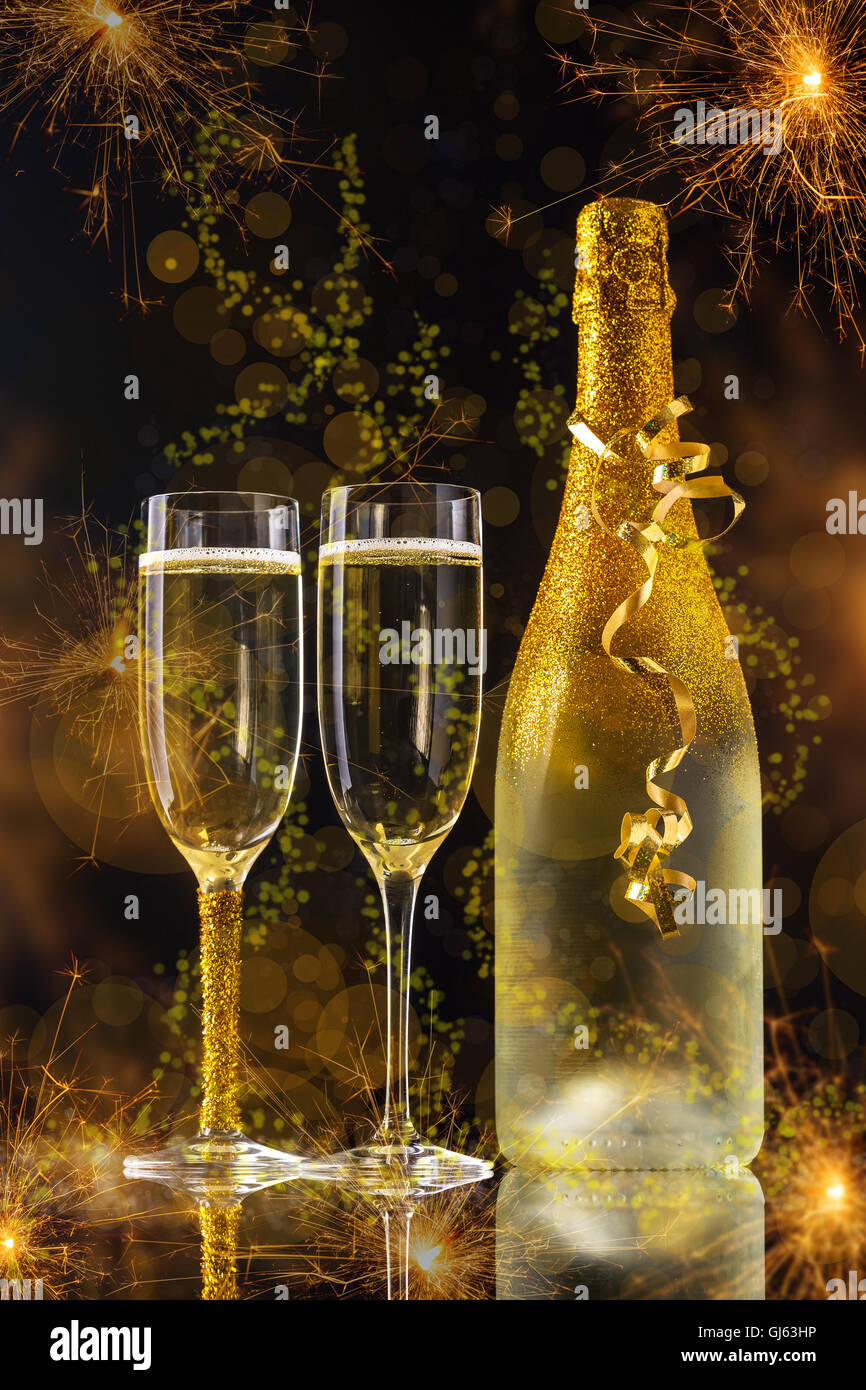 New Year celebration with champagne and sparkler Stock Photo - Alamy