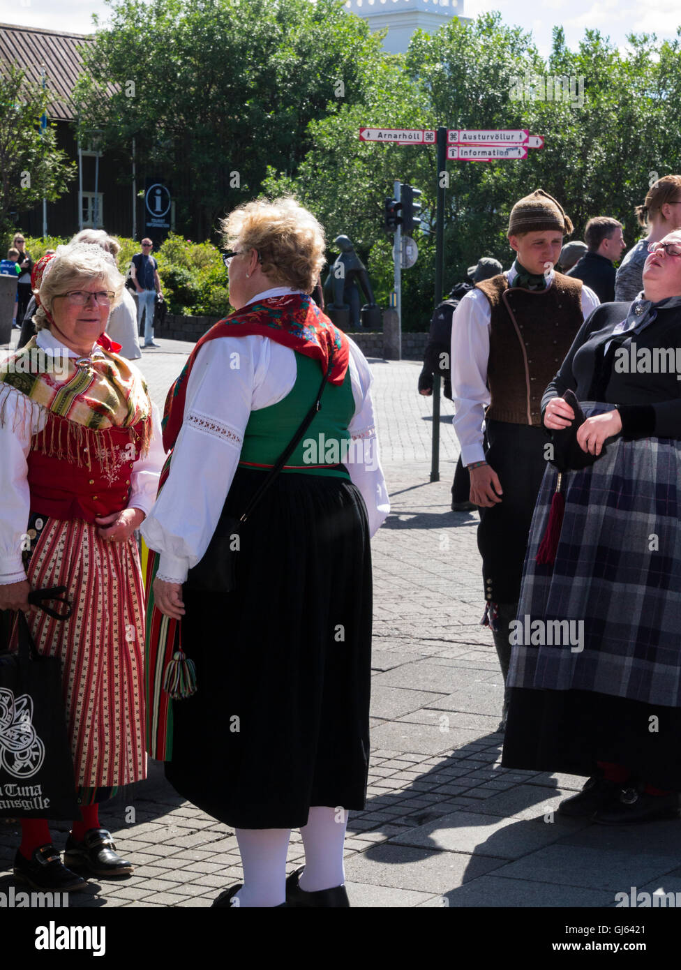 Group Icelandic people in National folk dress Reykjavik Iceland's capital city on a lovely July summers day vertical orientation Stock Photo