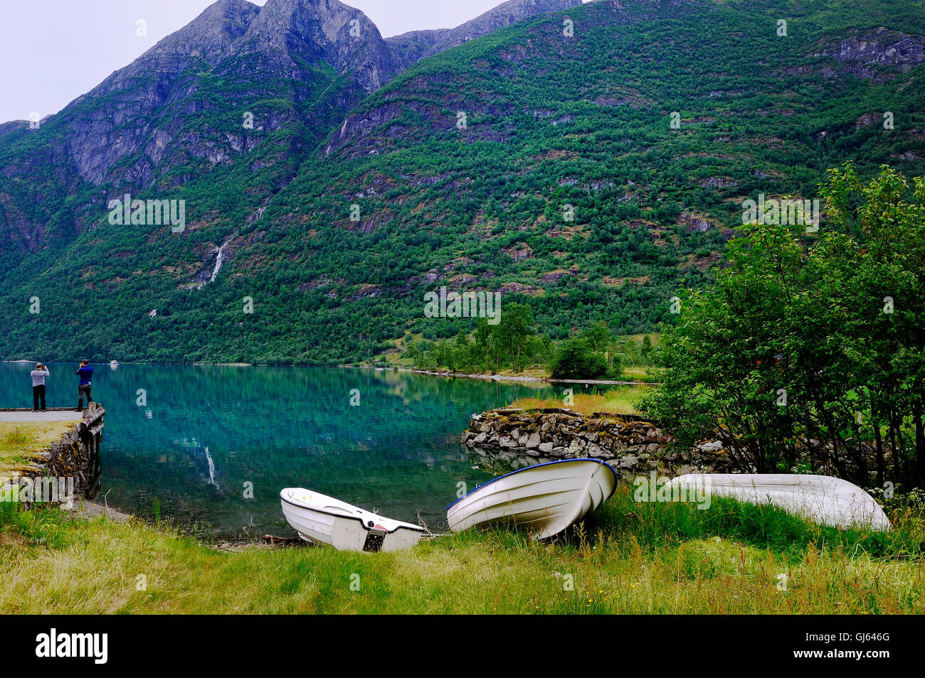 Two dinghies in a natural harbour Stock Photo Alamy