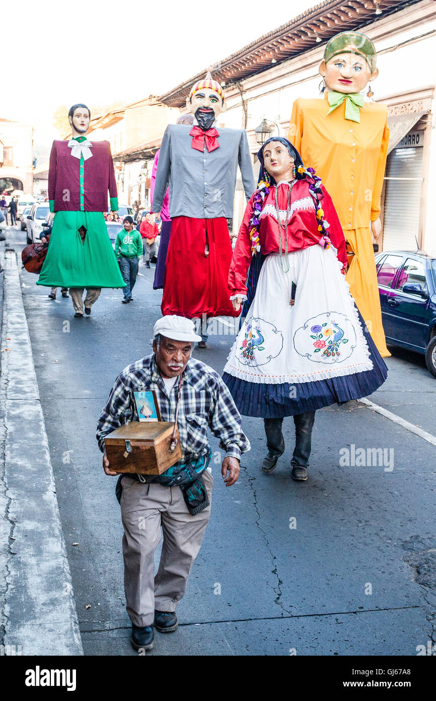 Giants walk the streets during a local festival in Patzcuaro, Michoacan, Mexico. Stock Photo