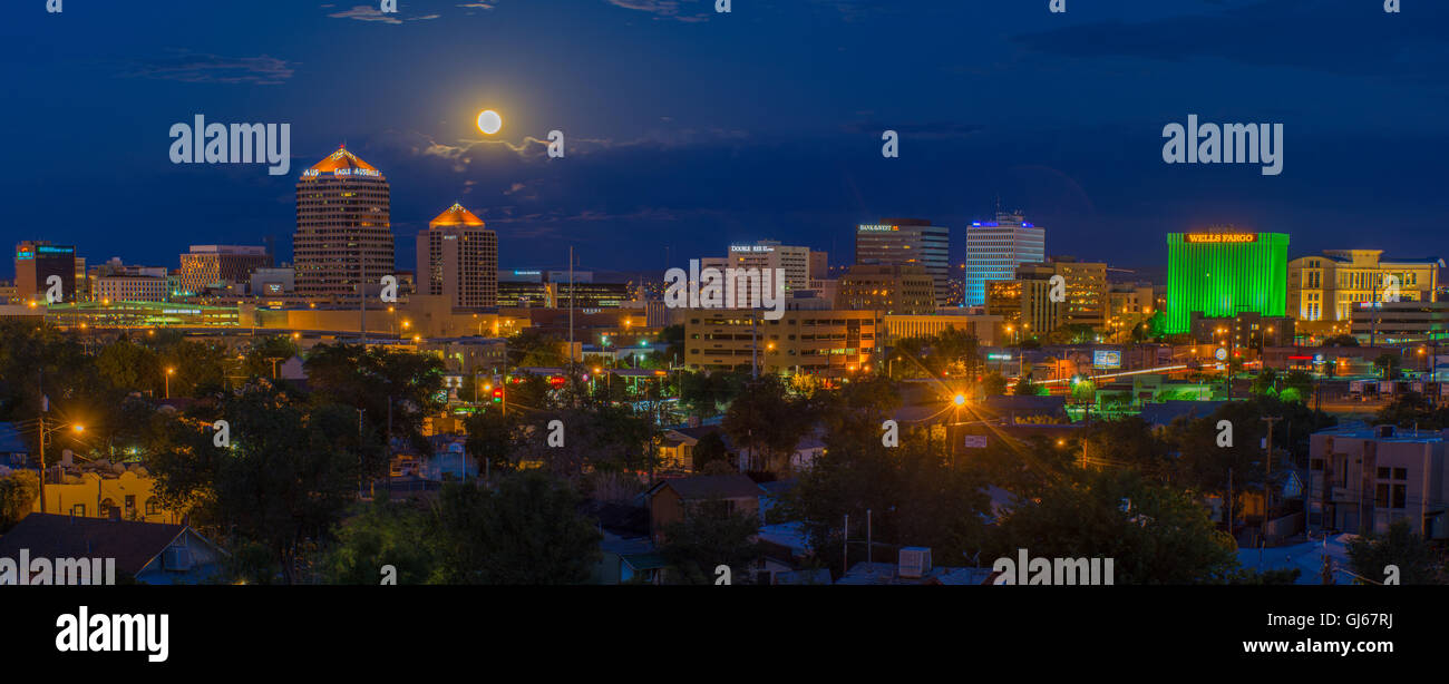 Moon-set behind downtown Albuquerque, New Mexico, USA. Stock Photo