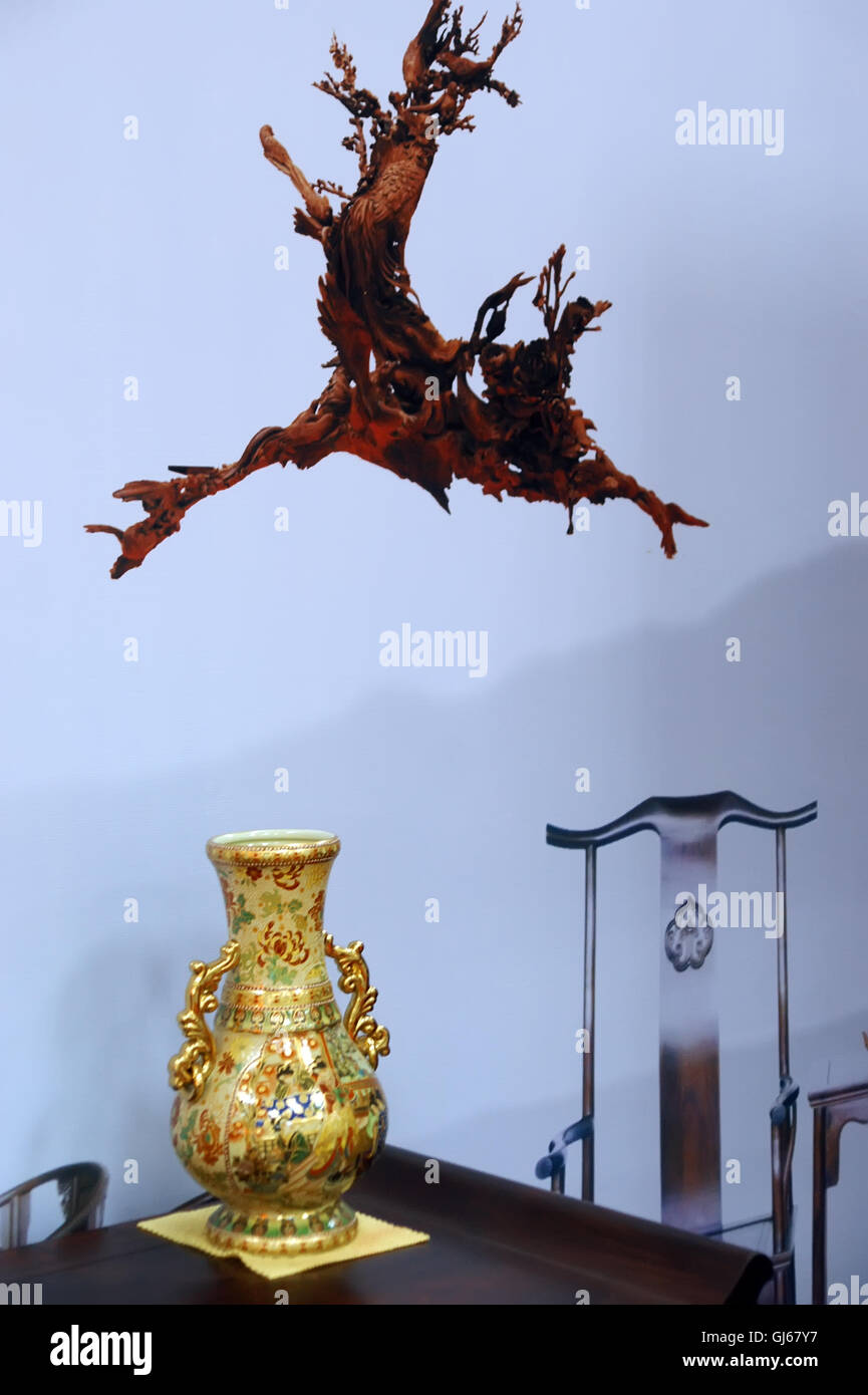 Vases and root carving Stock Photo - Alamy