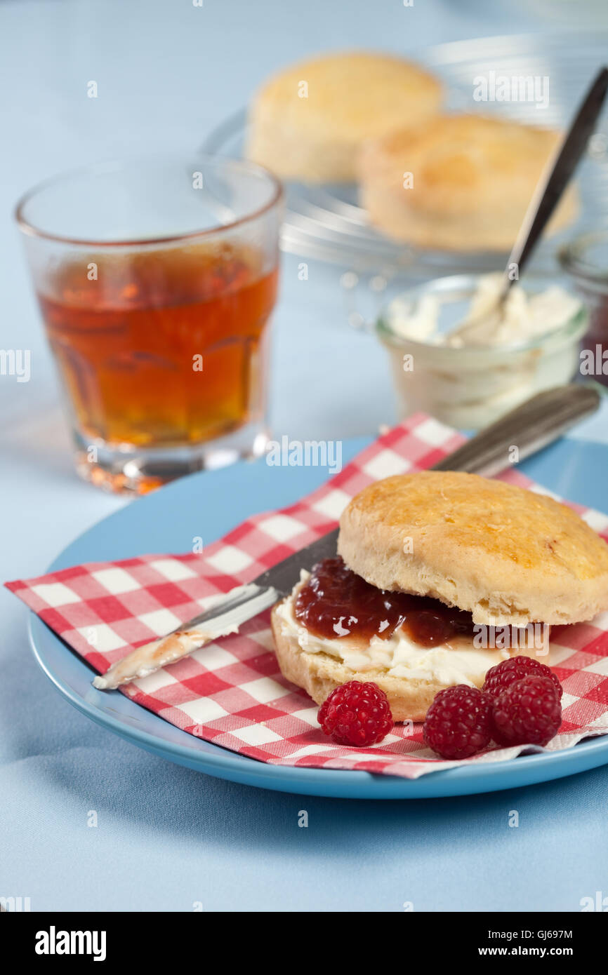 Scones with cream and jam Stock Photo - Alamy