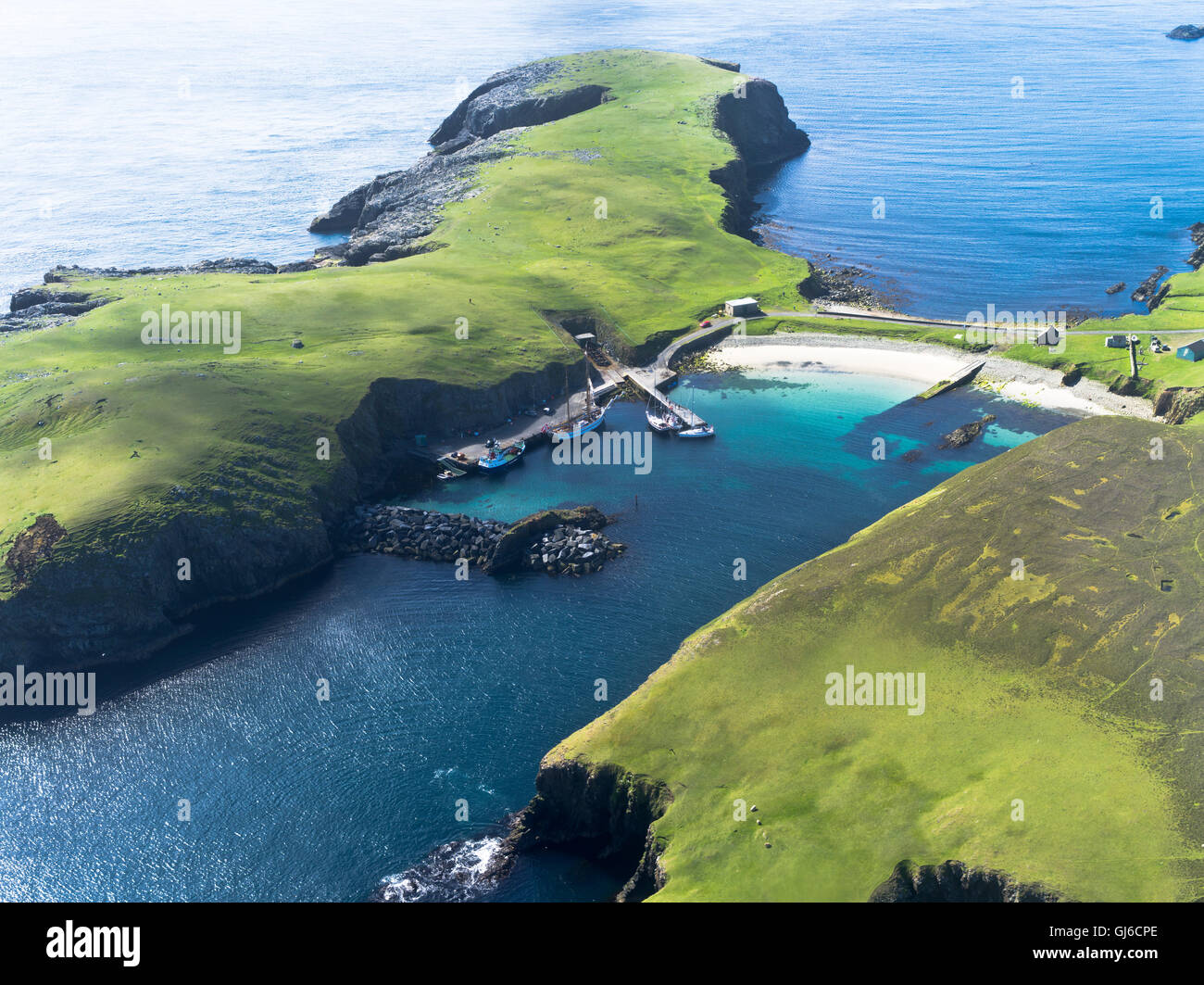 dh Bu Ness FAIR ISLE SHETLAND Scottish islands Aerial view of North Haven pier sand beach scotland harbour Stock Photo