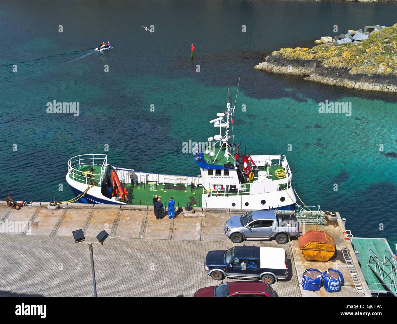dh Good Shepherd IV NORTH HAVEN HARBOUR FAIR ISLE  SCOTLAND Ferry people quayside scottish isles mail boat Stock Photo