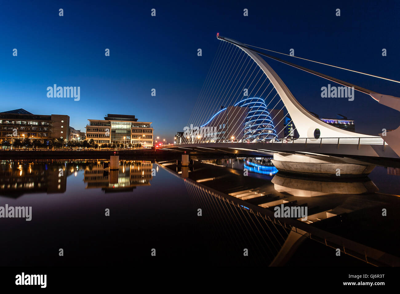 The Samuel Beckett Bridge over the river Liffey, Dublin at night Stock ...