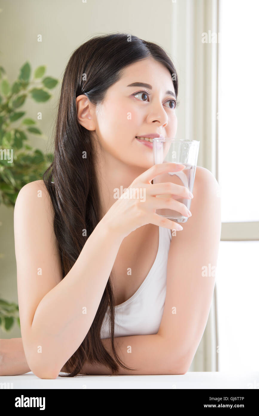 Drinking water is like washing out your insides. The water will cleanse the system, fill you up Stock Photo