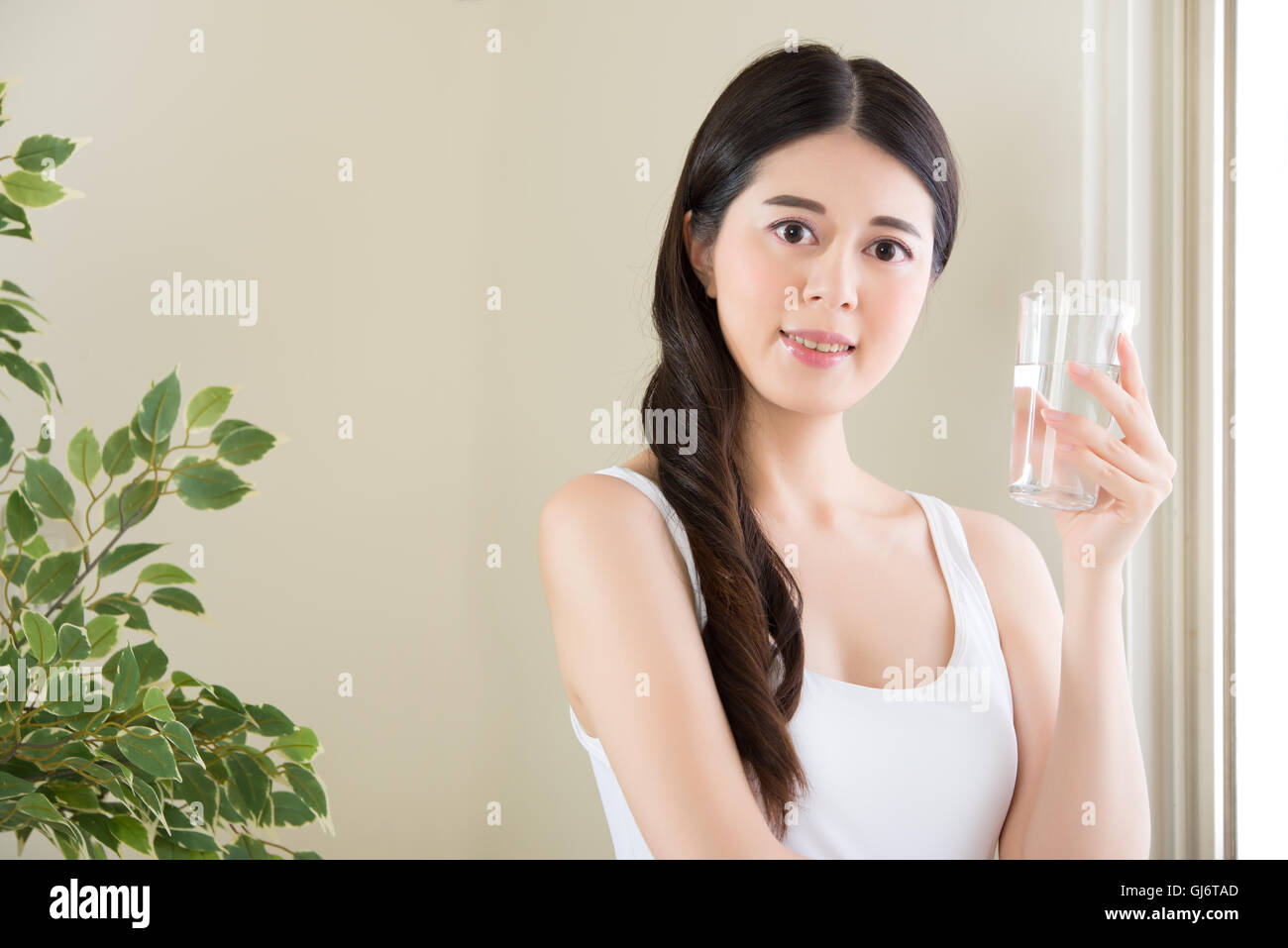 Drinking water is like washing out your insides. The water will cleanse the system, fill you up Stock Photo