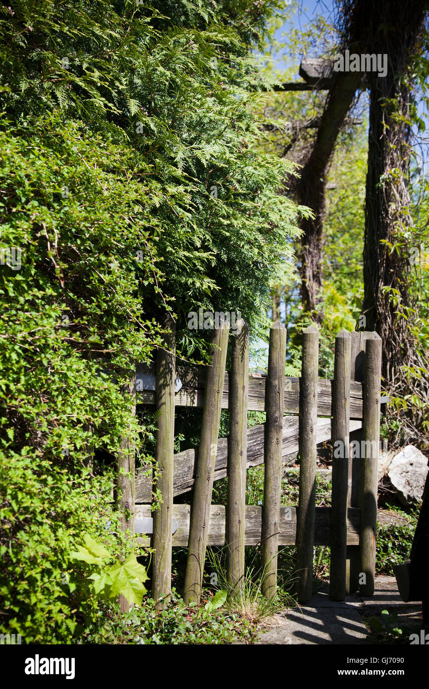 old garden fence at romantic garden Stock Photo - Alamy